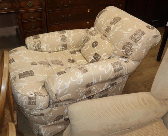 An early 20th century featherdown upholstered armchair
